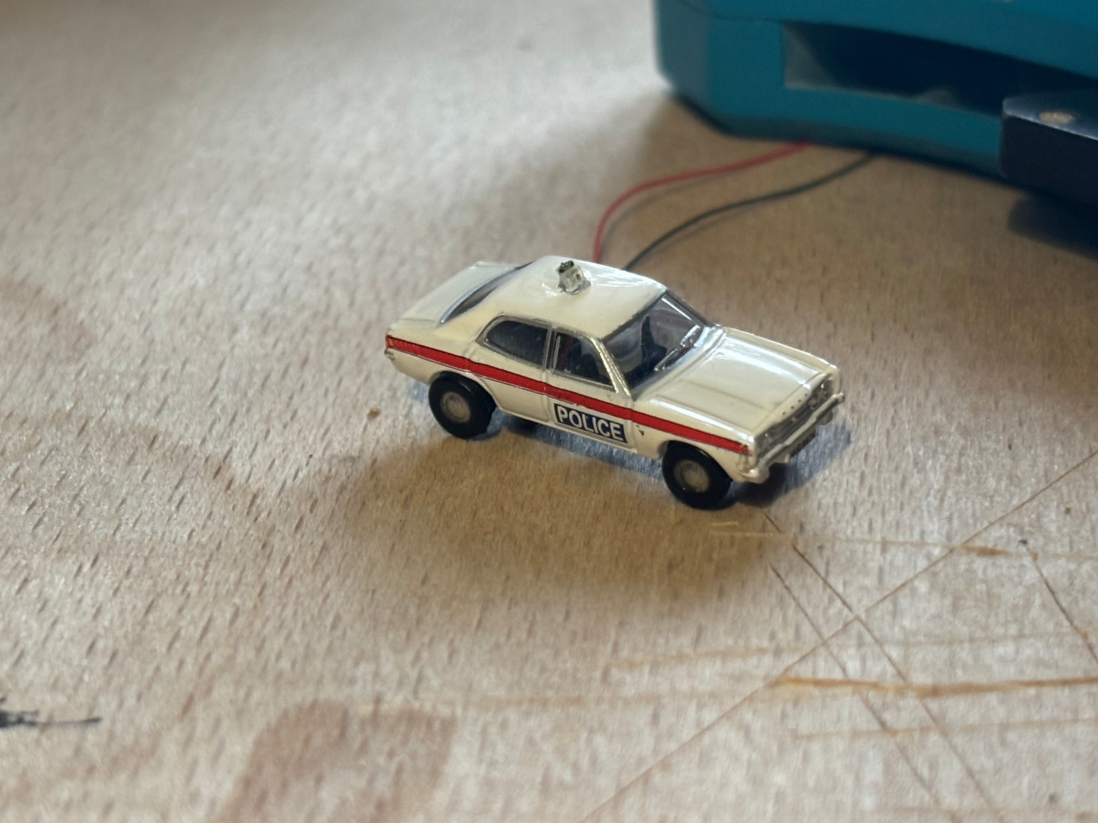 1:148 scale Oxford diecast Ford Cortina with flashing lights