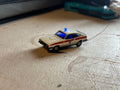 1:76 scale Ford Capri police car with flashing lights
