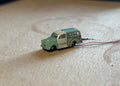 1:148 scale Oxford diecast Morris minor police car with flashing lights