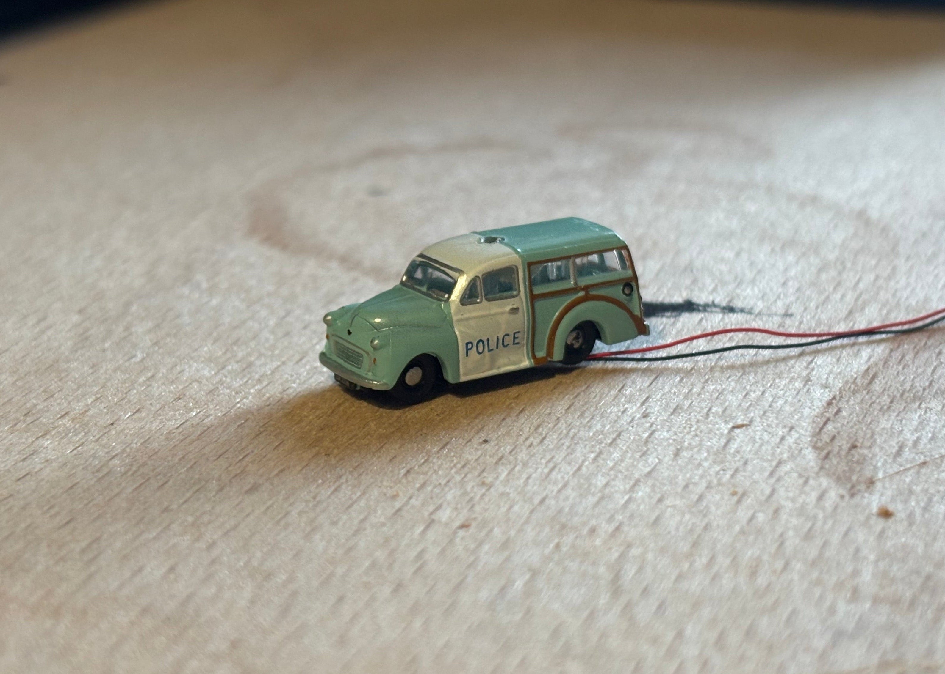 1:148 scale Oxford diecast Morris minor police car with flashing lights