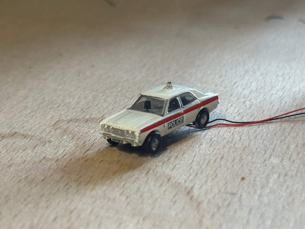 1:148 scale Oxford diecast Ford Cortina with flashing lights