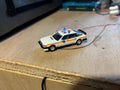1:76 scale Oxford diecast Rover police car with flashing lights
