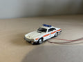 1:76 scale Oxford diecast Jaguar police car with flashing lights