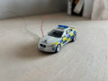 1:76 scale Oxford diecast Jaguar XF with flashing lights