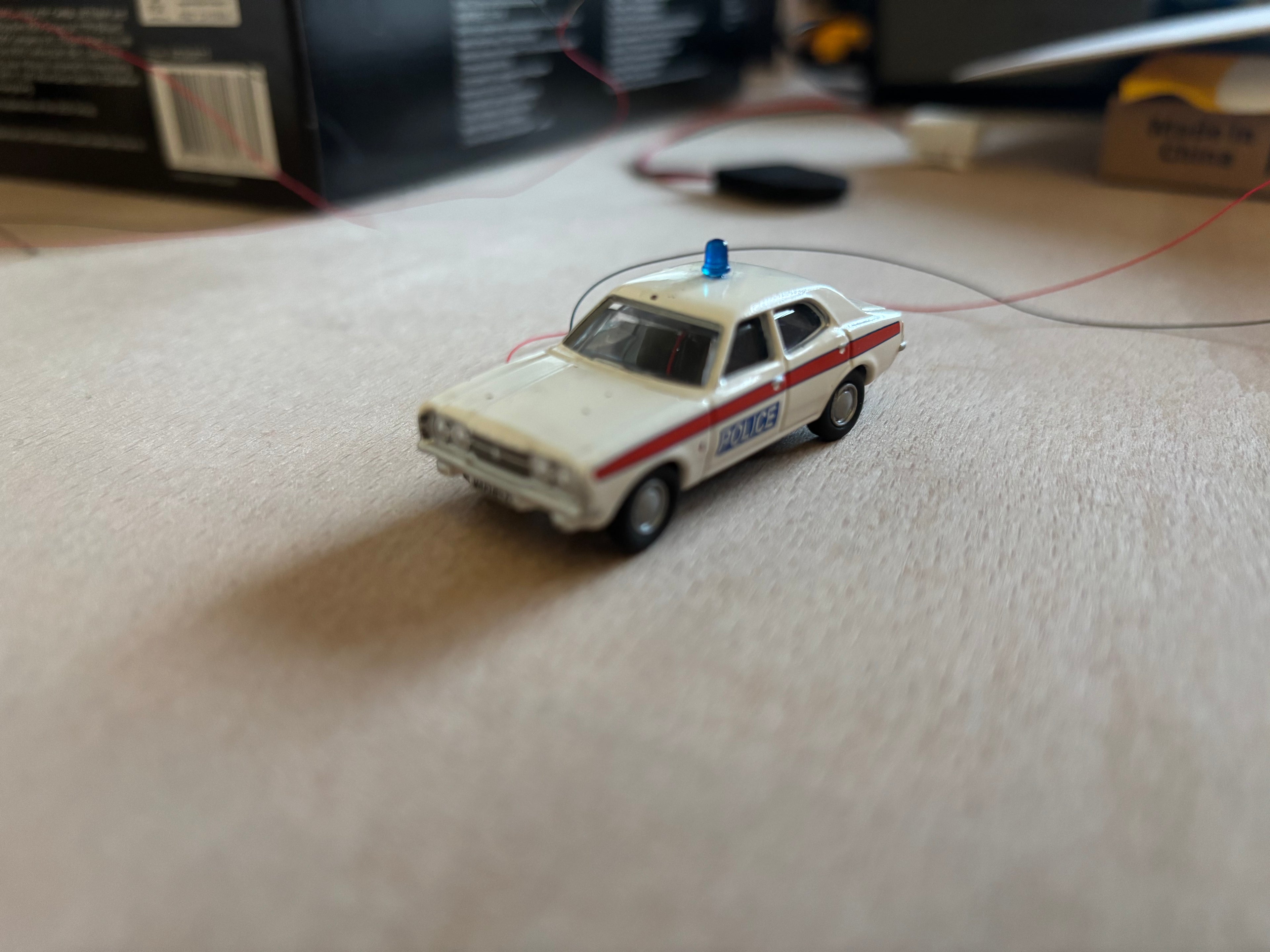 1:76 scale Oxford diecast Ford Cortina with flashing lights