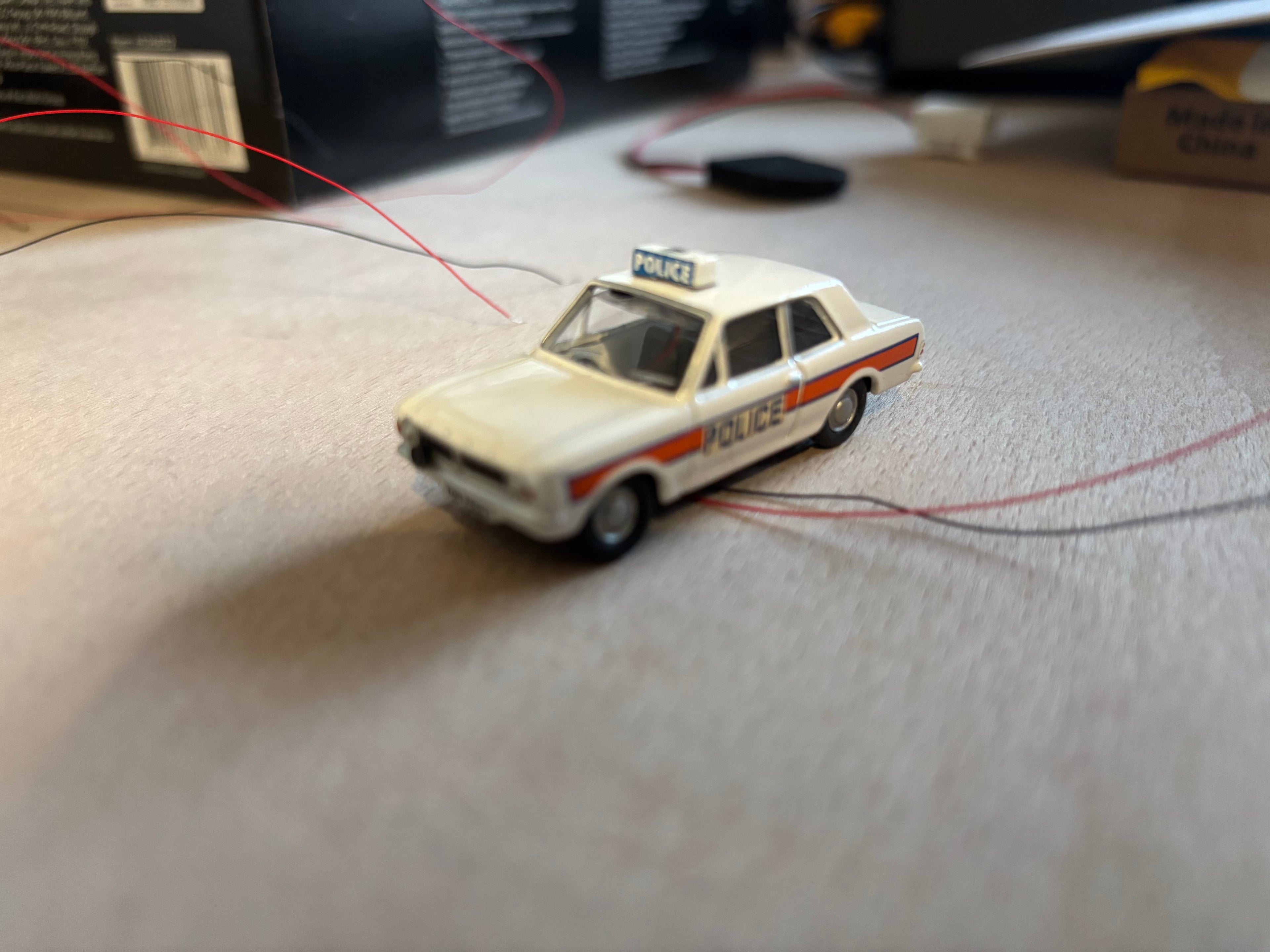 1:76 scale Oxford diecast Ford Cortina with flashing lights