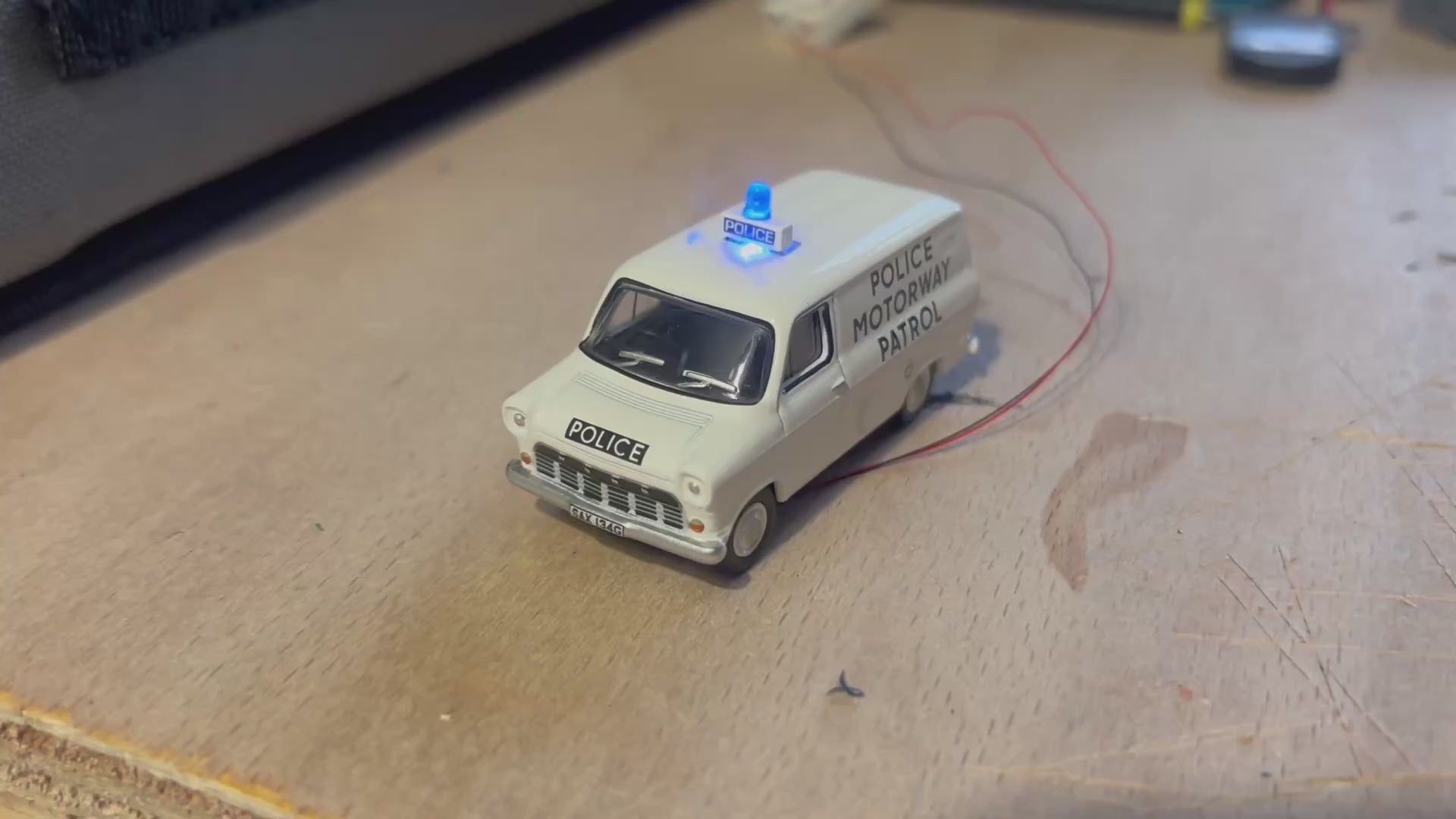 1:76 scale Oxford diecast Ford transit Mk1 police car with flashing blue lights
