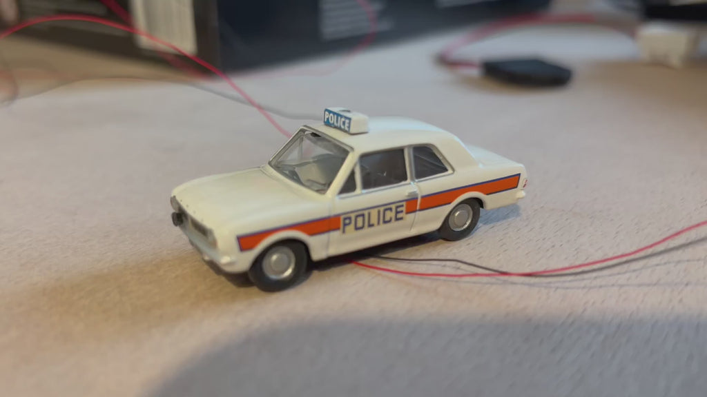 1:76 scale Oxford diecast Ford Cortina with flashing lights